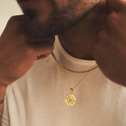 mens model shot of gold compass pendant 