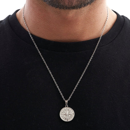 model shot of silver box chain compass pendant